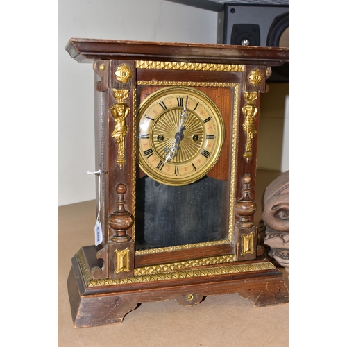 437 - TWO MANTEL CLOCKS, comprising an Art Nouveau mantel clock, the solid wooden case of compressed oval ... 