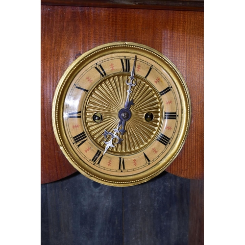 437 - TWO MANTEL CLOCKS, comprising an Art Nouveau mantel clock, the solid wooden case of compressed oval ... 