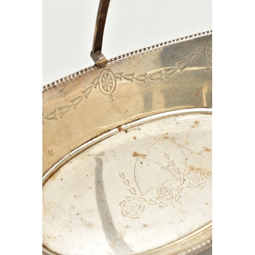 100 - A SILVER BASKET,  a boat shaped dish, engraved with floral detail, fitted with a tapered handle, app... 