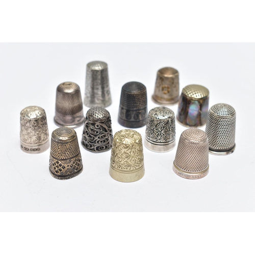 105 - TWELVE THIMBLES, to include six with silver hallmarks, approximate gross weight 27.0 grams, six othe... 