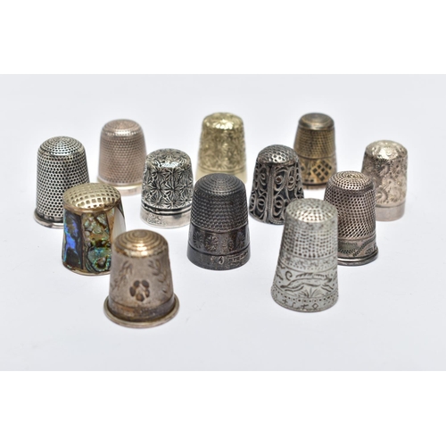 105 - TWELVE THIMBLES, to include six with silver hallmarks, approximate gross weight 27.0 grams, six othe... 