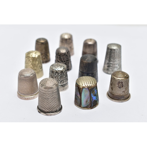 105 - TWELVE THIMBLES, to include six with silver hallmarks, approximate gross weight 27.0 grams, six othe... 