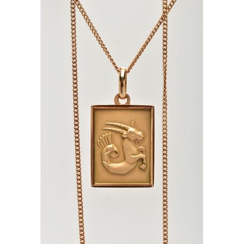 110 - A YELLOW METAL CAPRICORN STAR SIGN PENDANT NECKLACE, the pendant of a rectangular form depicting the... 