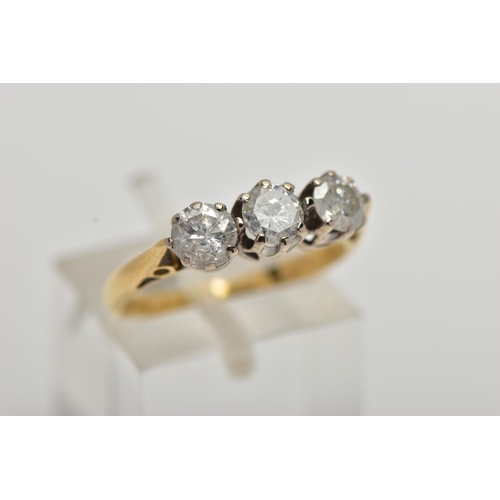 14 - AN 18CT GOLD THREE STONE DIAMOND RING, set with three round brilliant cut diamonds, each in a six cl... 