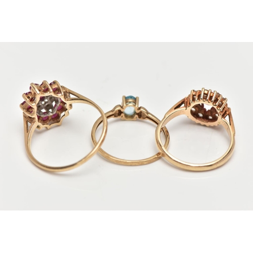 15 - THREE GEM SET RINGS, the first designed as a tiered  marquise shape cluster set with rubies and diam... 