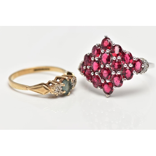 16 - TWO GEM SET RINGS, the first a large marquise shape ring set with sixteen oval cut garnets, each in ... 