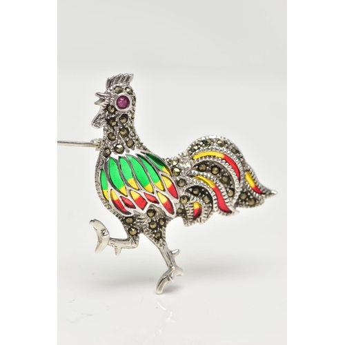 27 - A WHITE METAL PLIQUE A JOUR BROOCH, in the form of a cockerel, marcasite detail to the body with a r... 