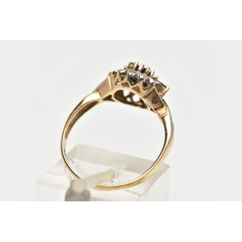 28 - A 9CT GOLD CLUSTER RING, of a circular form, set with an oval and two circular cut blue sapphires, w... 