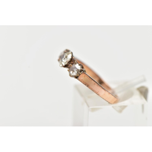 39 - A YELLOW METAL DIAMOND RING, centering on an old cut diamond, and two rose cut diamonds, prong set i... 