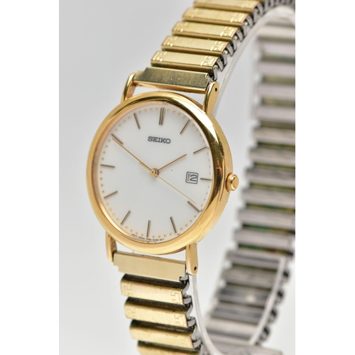 52 - A 9CT GOLD 'SEIKO' WRISTWATCH, a quartz movement, round white dial, signed 'Seiko', baton markers, d... 