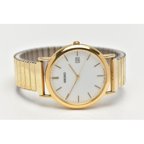 52 - A 9CT GOLD 'SEIKO' WRISTWATCH, a quartz movement, round white dial, signed 'Seiko', baton markers, d... 