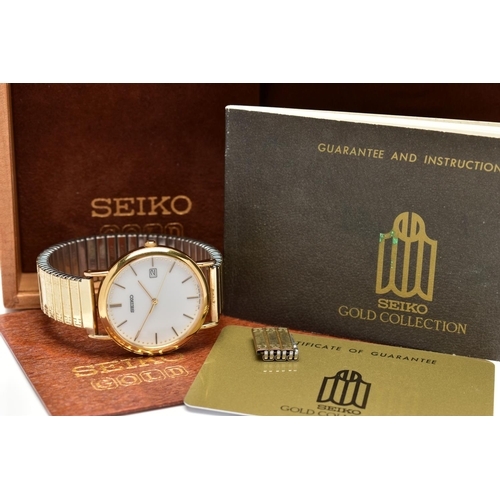 52 - A 9CT GOLD 'SEIKO' WRISTWATCH, a quartz movement, round white dial, signed 'Seiko', baton markers, d... 