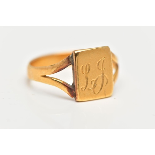 55 - A YELLOW METAL SIGNET RING, rectangular form signet, engraved 'LJ', leading onto bifurcated shoulder... 