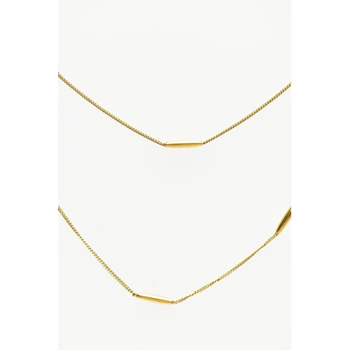 6 - A YELLOW METAL NECKLACE, designed as a series of plain polished tubular links, to the flat curb link... 