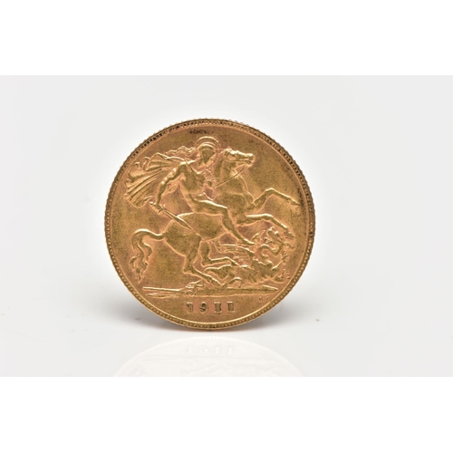 65 - A HALF SOVEREIGN COIN, George V to the obverse, George and the Dragon to reverse dated 1911, approxi... 