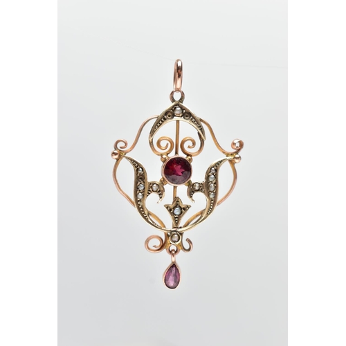 68 - AN EDWARDIAN GEM SET PENDANT, openwork pendant set with a circular cut ruby and a pear cut amethyst ... 