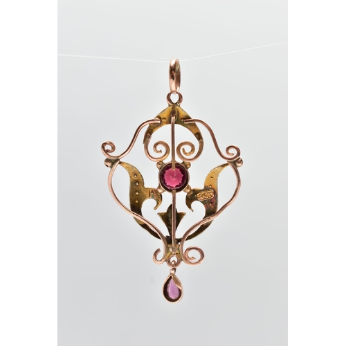 68 - AN EDWARDIAN GEM SET PENDANT, openwork pendant set with a circular cut ruby and a pear cut amethyst ... 