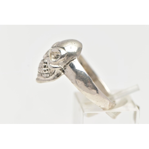 69 - A WHITE METAL SKULL RING, polished skull to the band, stamped 925, ring size U, approximate gross we... 