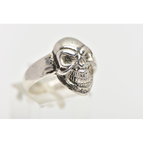 69 - A WHITE METAL SKULL RING, polished skull to the band, stamped 925, ring size U, approximate gross we... 