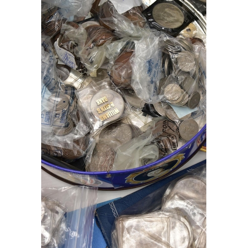 97 - A BAG CONTAINING A TIN AND COIN CASE, to include over 300gr of Silver content coins, a 1981 christma... 