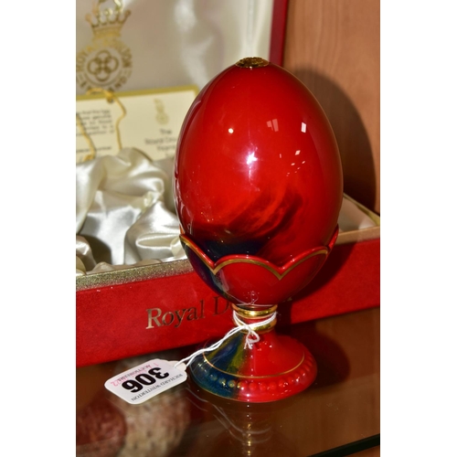 306 - A  BOXED ROYAL DOULTON FLAMBÉ EGG AND STAND, limited to a worldwide edition of 3500, this piece is n... 