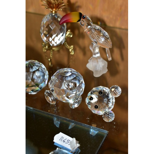 308 - FOUR SWAROVSKI CRYSTAL ORNAMENTS AND TWO COLOURED CRYSTAL PAPERWEIGHTS, comprising a Santa Maria -16... 