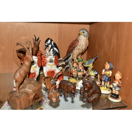 310 - A GROUP OF EIGHT ASSORTED GOEBEL FIGURES AND FIVE  CARVED WOOD ANIMALS, comprising a carved wood dee... 