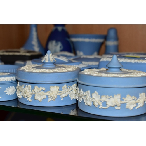 369 - A LARGE QUANTITY OF WEDGWOOD BLUE JASPER GIFT WARE, comprising a modern pale blue lidded pot- W40100... 