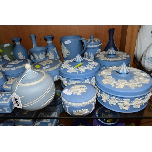 369 - A LARGE QUANTITY OF WEDGWOOD BLUE JASPER GIFT WARE, comprising a modern pale blue lidded pot- W40100... 