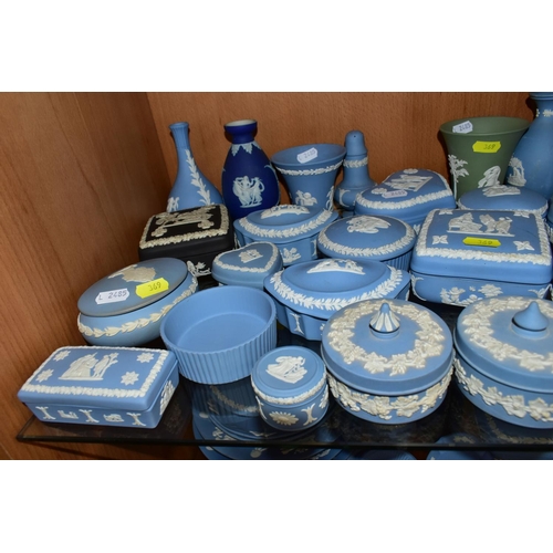 369 - A LARGE QUANTITY OF WEDGWOOD BLUE JASPER GIFT WARE, comprising a modern pale blue lidded pot- W40100... 