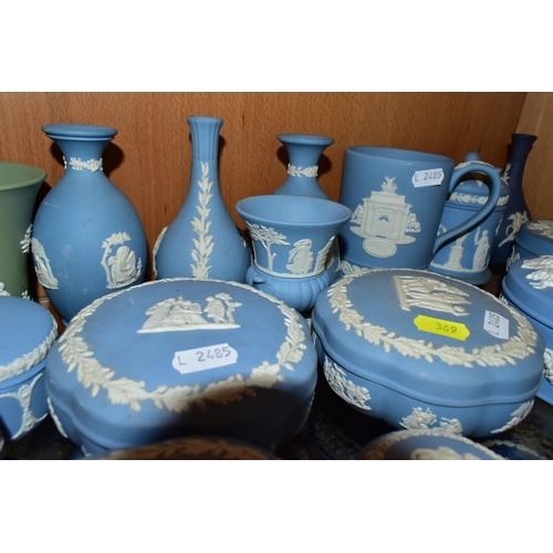 369 - A LARGE QUANTITY OF WEDGWOOD BLUE JASPER GIFT WARE, comprising a modern pale blue lidded pot- W40100... 