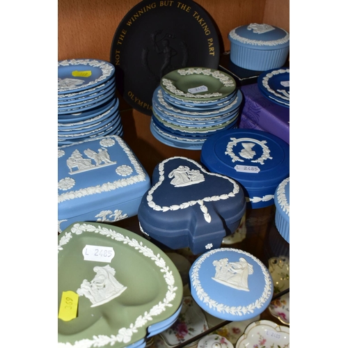 369 - A LARGE QUANTITY OF WEDGWOOD BLUE JASPER GIFT WARE, comprising a modern pale blue lidded pot- W40100... 