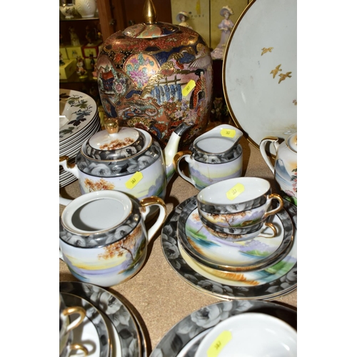 387 - A QUANTITY OF ORIENTAL CERAMICS, comprising a footed charger decorated with a scene a of a cherry bl... 