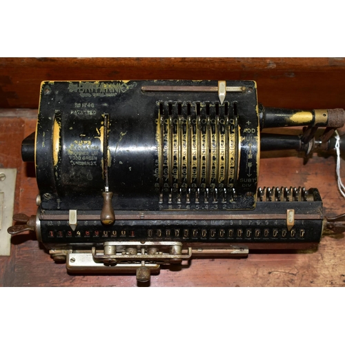 394 - A GUYS BRITANNIC CALCULATING MACHINE, with wooden cover