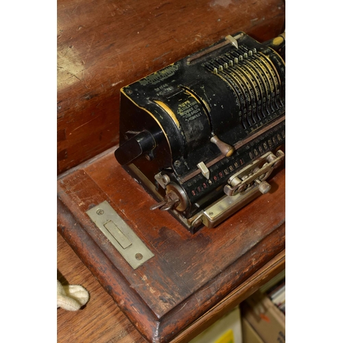 394 - A GUYS BRITANNIC CALCULATING MACHINE, with wooden cover