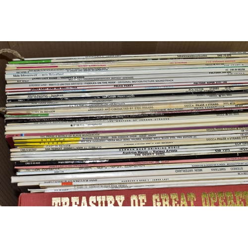 396 - TWO BOXES OF LP RECORDS AND 7 INCH SINGLES, to include classical, Russian folk songs, German beer dr... 