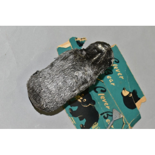 398 - A T.N. CLOCKWORK 'CLEVER BEAR' TOY, made in Japan, height 6.5cm x length 12cm, with partial box (mis... 