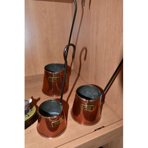 405 - A GROUP OF CERAMICS AND METALWARES, to include three copper cider measures, a Hockley Lamp & Limelig... 