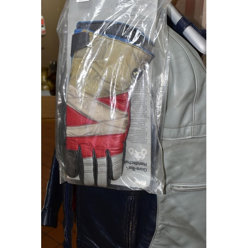 407 - A MOTORCYCLE LEATHER JACKET, TROUSERS, GLOVES AND BOOTS,  comprising a BMW navy and grey leather jac... 