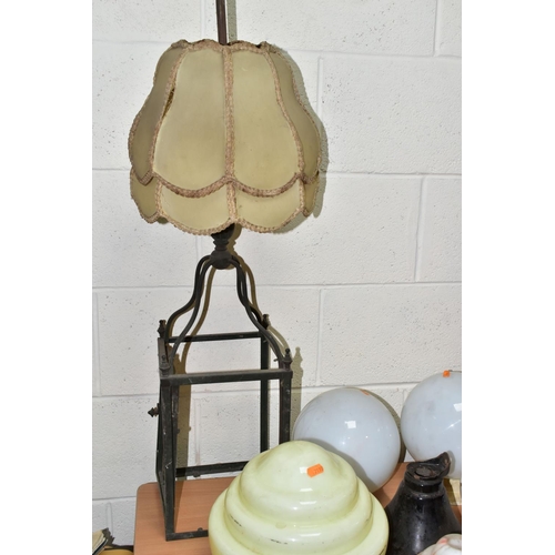 409 - TWO VINTAGE TABLE LAMPS AND A GROUP OF ASSORTED GLASS SHADES, comprising a large green onyx and gilt... 