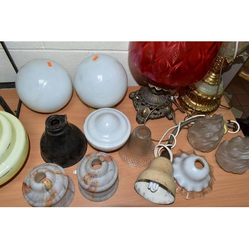 409 - TWO VINTAGE TABLE LAMPS AND A GROUP OF ASSORTED GLASS SHADES, comprising a large green onyx and gilt... 