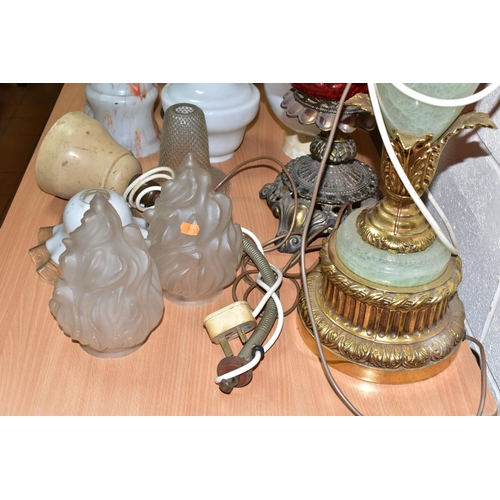 409 - TWO VINTAGE TABLE LAMPS AND A GROUP OF ASSORTED GLASS SHADES, comprising a large green onyx and gilt... 