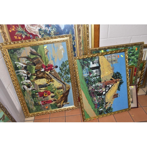 440 - ELEVEN MODERN FRAMED NEEDLEWORK PICTURES ETC, subjects include a coaching scene, a unicorn hunting s... 