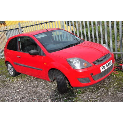 1001 - A 2006 FORD FIESTA 3 DOOR HATCHBACK CAR in red, 1242cc petrol engine, five speed manual gearbox, fir... 