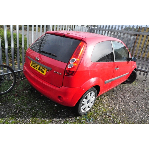 1001 - A 2006 FORD FIESTA 3 DOOR HATCHBACK CAR in red, 1242cc petrol engine, five speed manual gearbox, fir... 