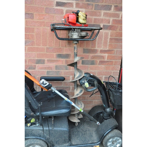 1002 - A CLARKE ED160 PETROL EARTH BORE with a 8in boring bit, (engine pulls freely but hasn't started, fue... 