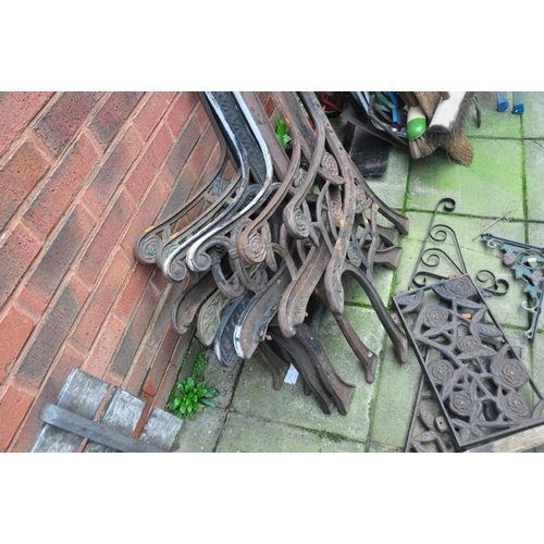 1010 - THREE PAIRS OF MODERN CAST IRON GARDEN BENCH ENDS, two matching back panels, and two wrought iron sh... 