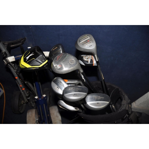 1051 - A SELECTION OF GOLFING EQUIPMENT to include a Progen golf bag containing various clubs, Voodoo, Slaz... 