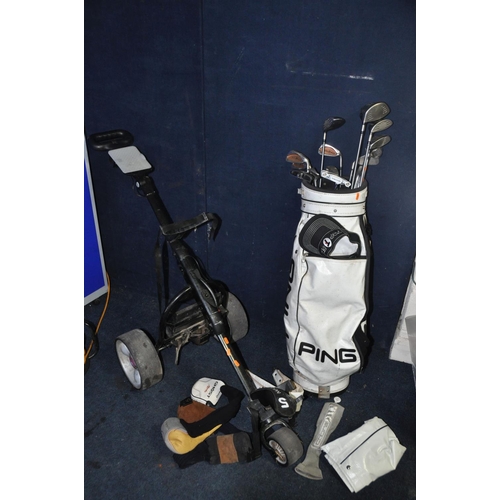 1052 - A PING GOLF BAG CONTAINING TAYLOR MADE CLUBS comprising a partial set of Taylor made clubs along wit... 