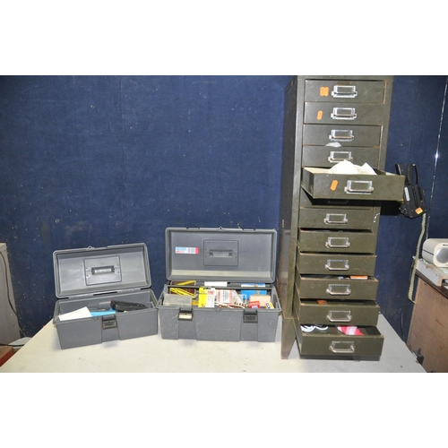 1053 - A NINE DRAW FILING CABINET containing miscellaneous items such as hooks, string, handles, pins etc. ... 